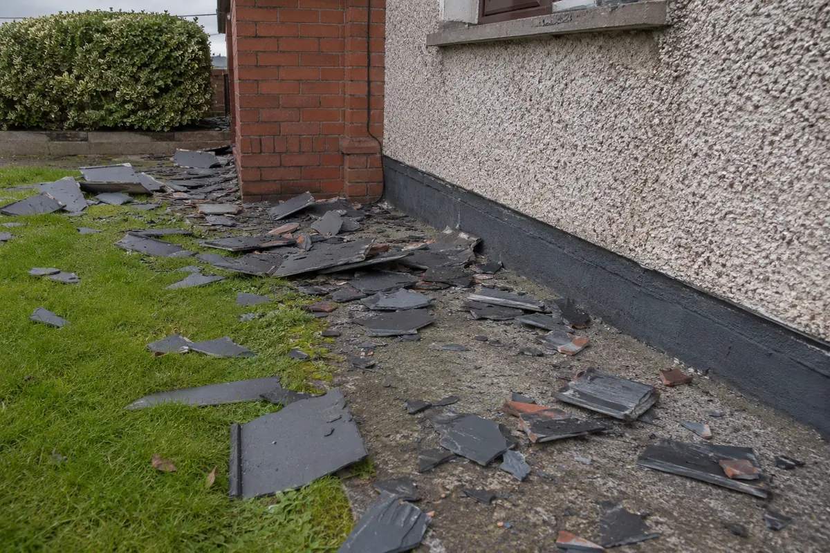 Storm-damaged slates lifted off a Dublin roof