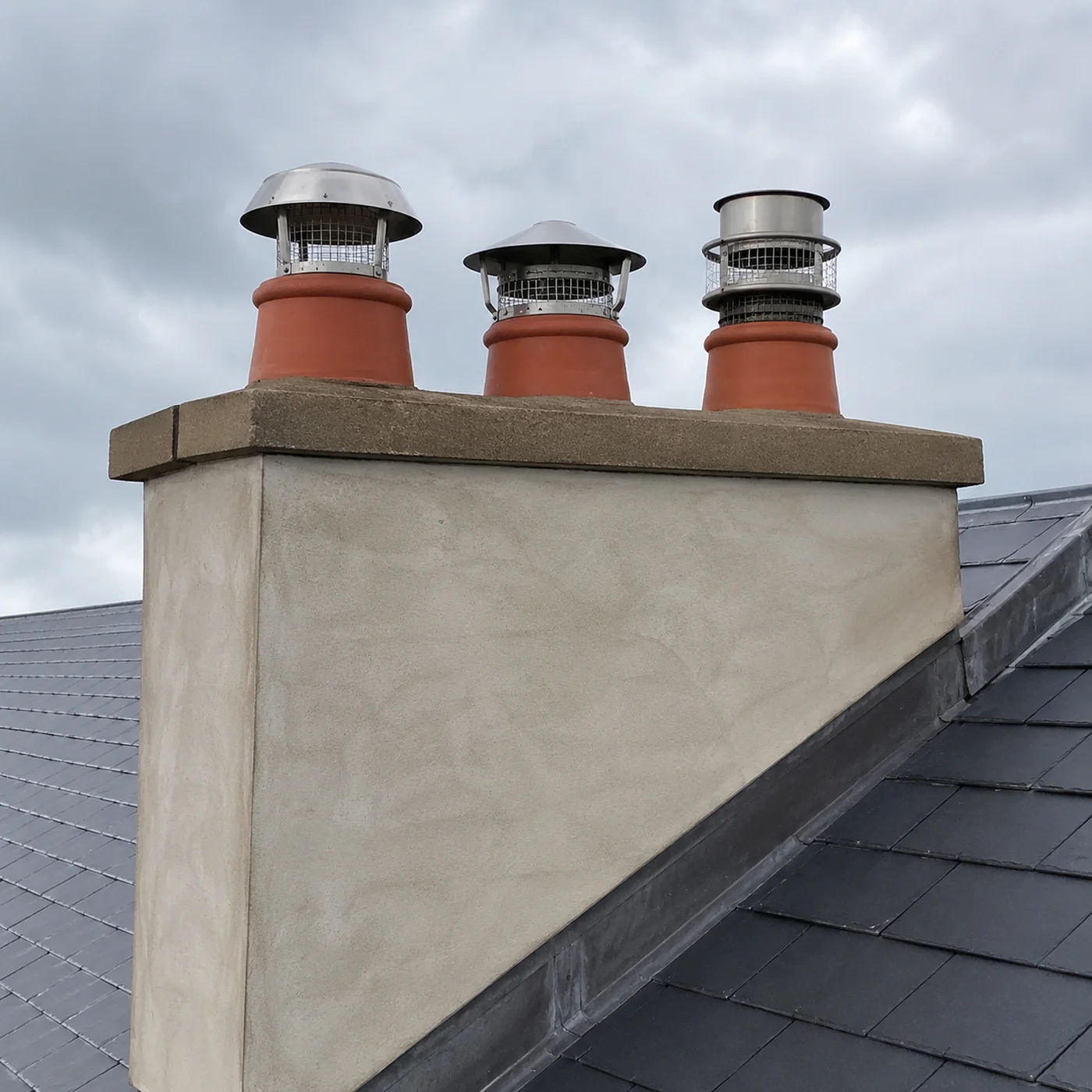 A finished chimney stack with new pots and cowls in Dublin