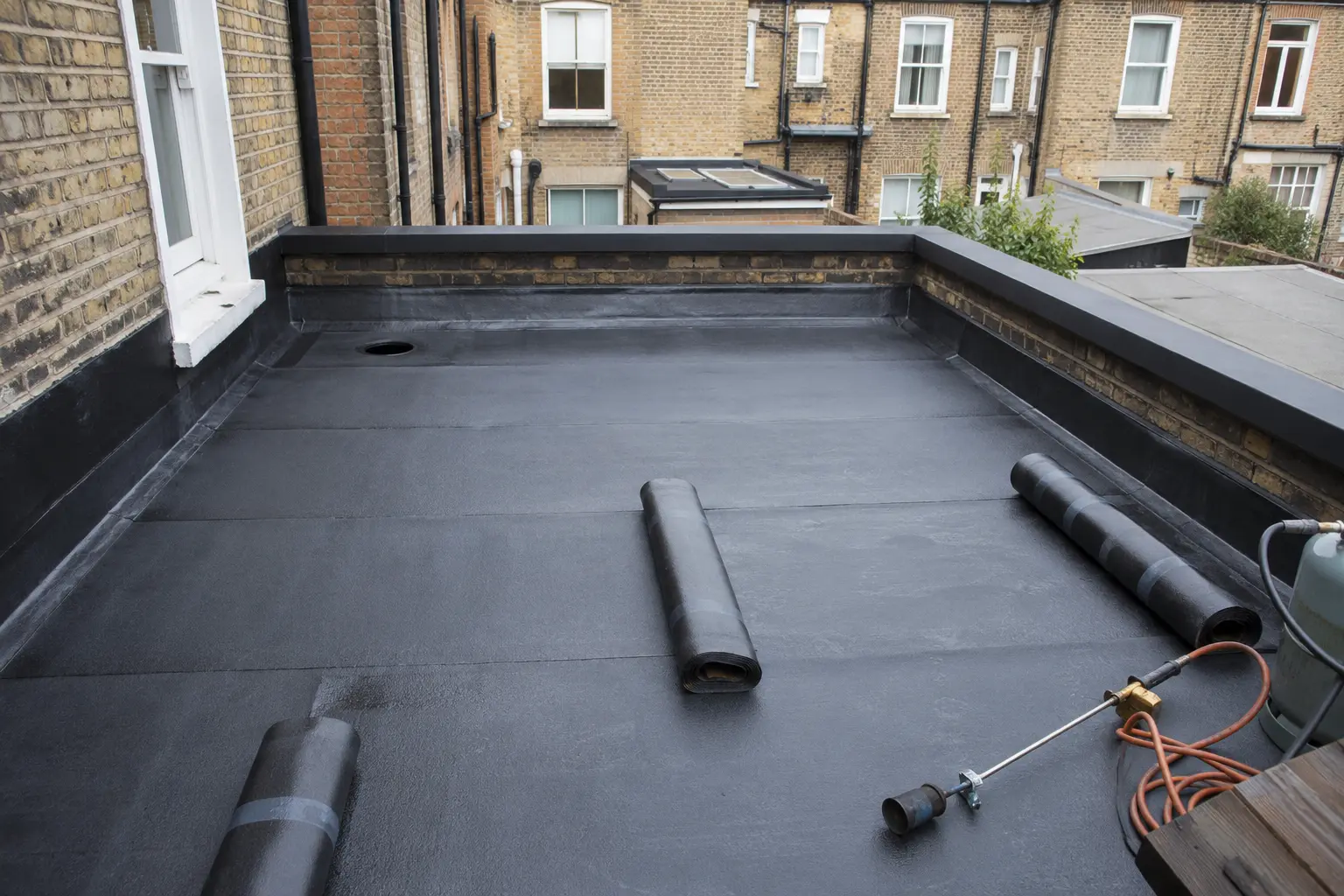 A flat roof being re-covered on a Dublin home