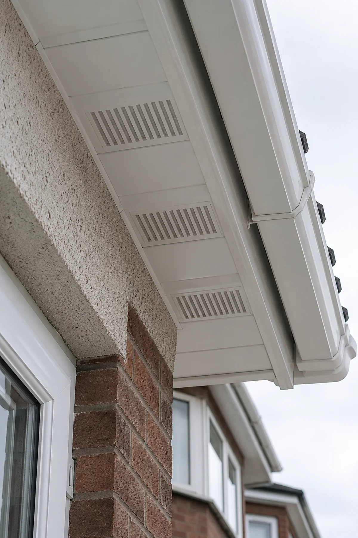 New vented uPVC soffit and fascia at the eaves of a Dublin home