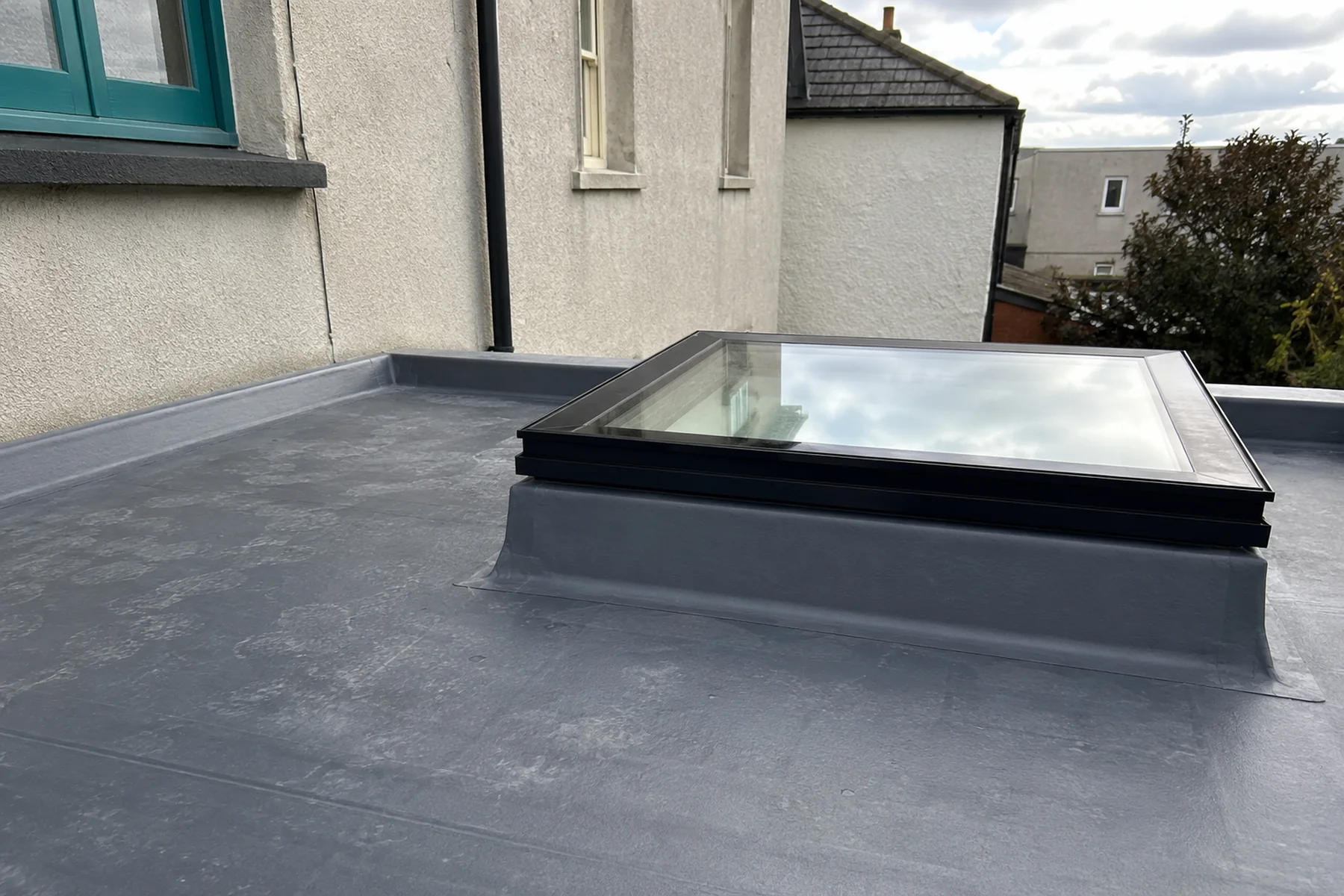 A rooflight dressed into a new flat roof in Dublin