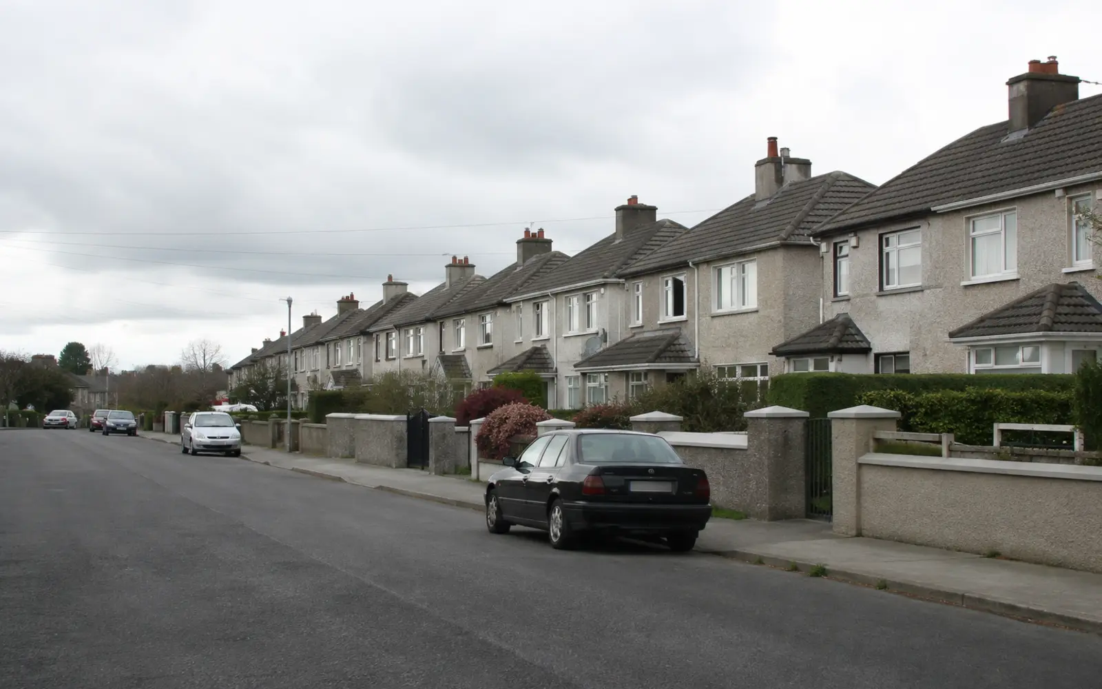 Long uniform runs of 1950s hipped tile roofs on the Artane estate, Dublin