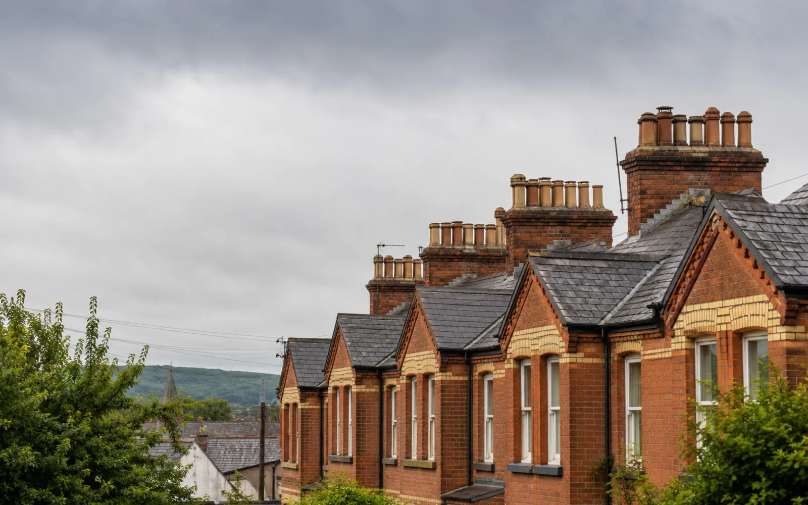 Victorian slate roofs and chimney stacks on a red-brick terrace in Ranelagh, Dublin