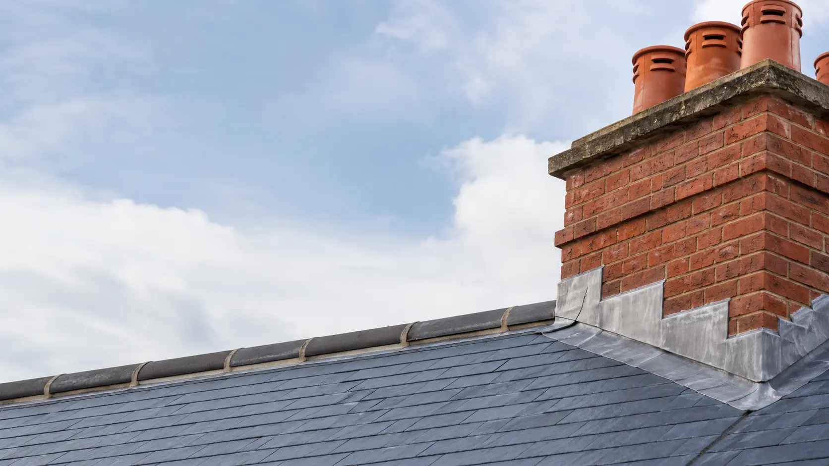 Fresh lead flashing dressed around a Dublin chimney stack