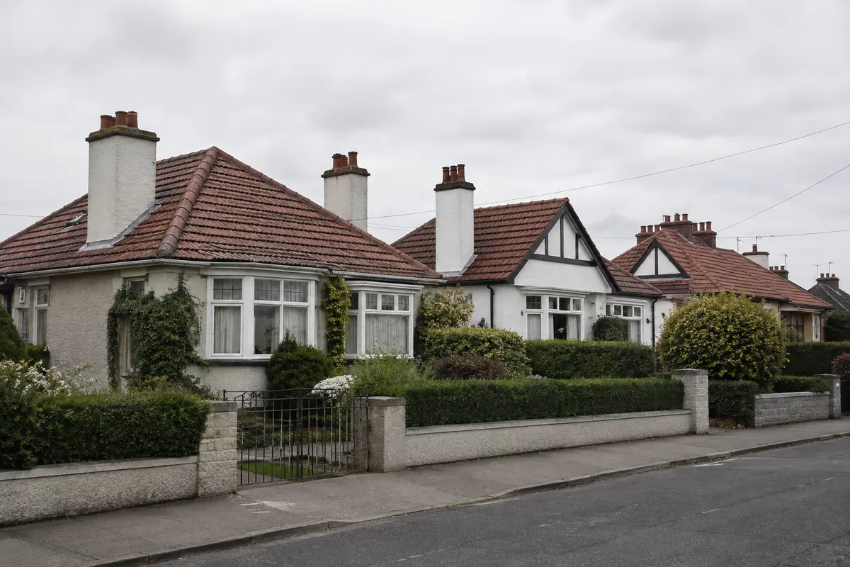 Original village bungalows with hipped clay tile roofs in Killester, Dublin