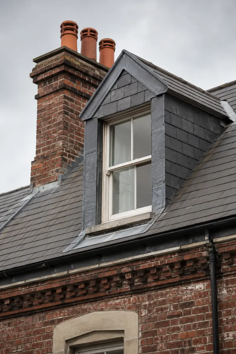 A slated dormer on an Edwardian roof in Terenure being restored