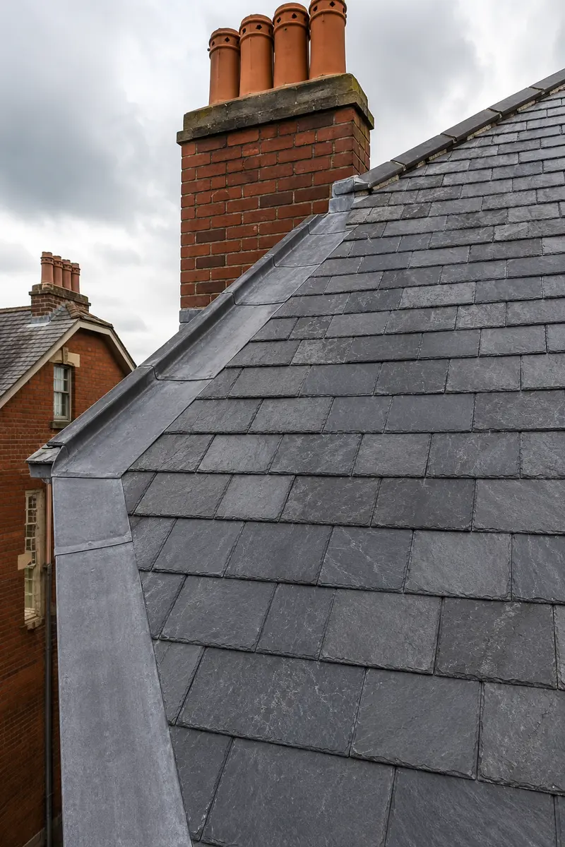 Natural slate coursing on a Victorian artisan terrace roof in Portobello