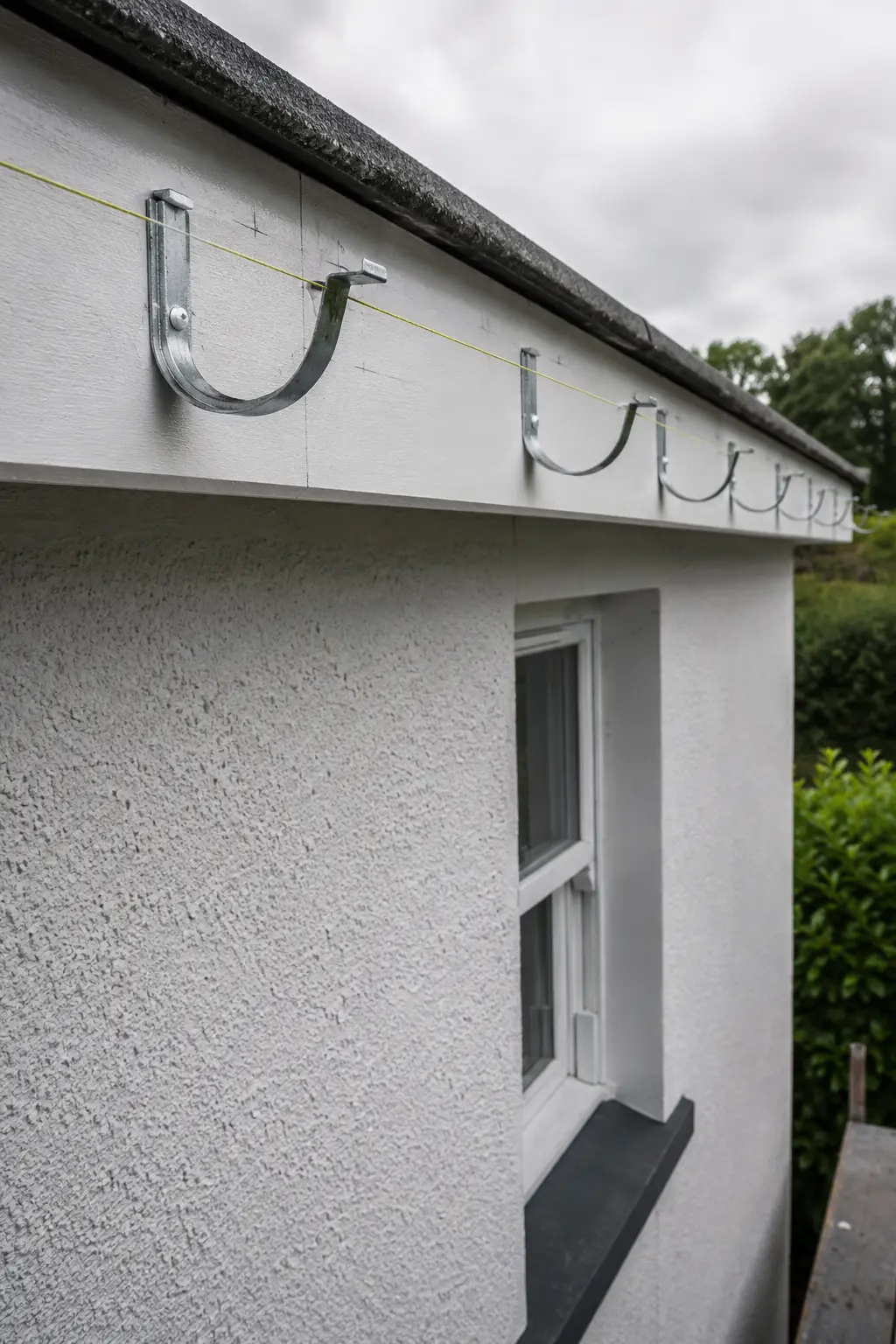 A Dublin roofer making a storm-damaged roof safe