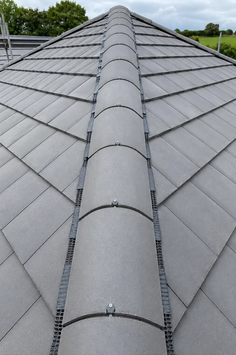 A finished mortar-free dry ridge system on a Dublin roof
