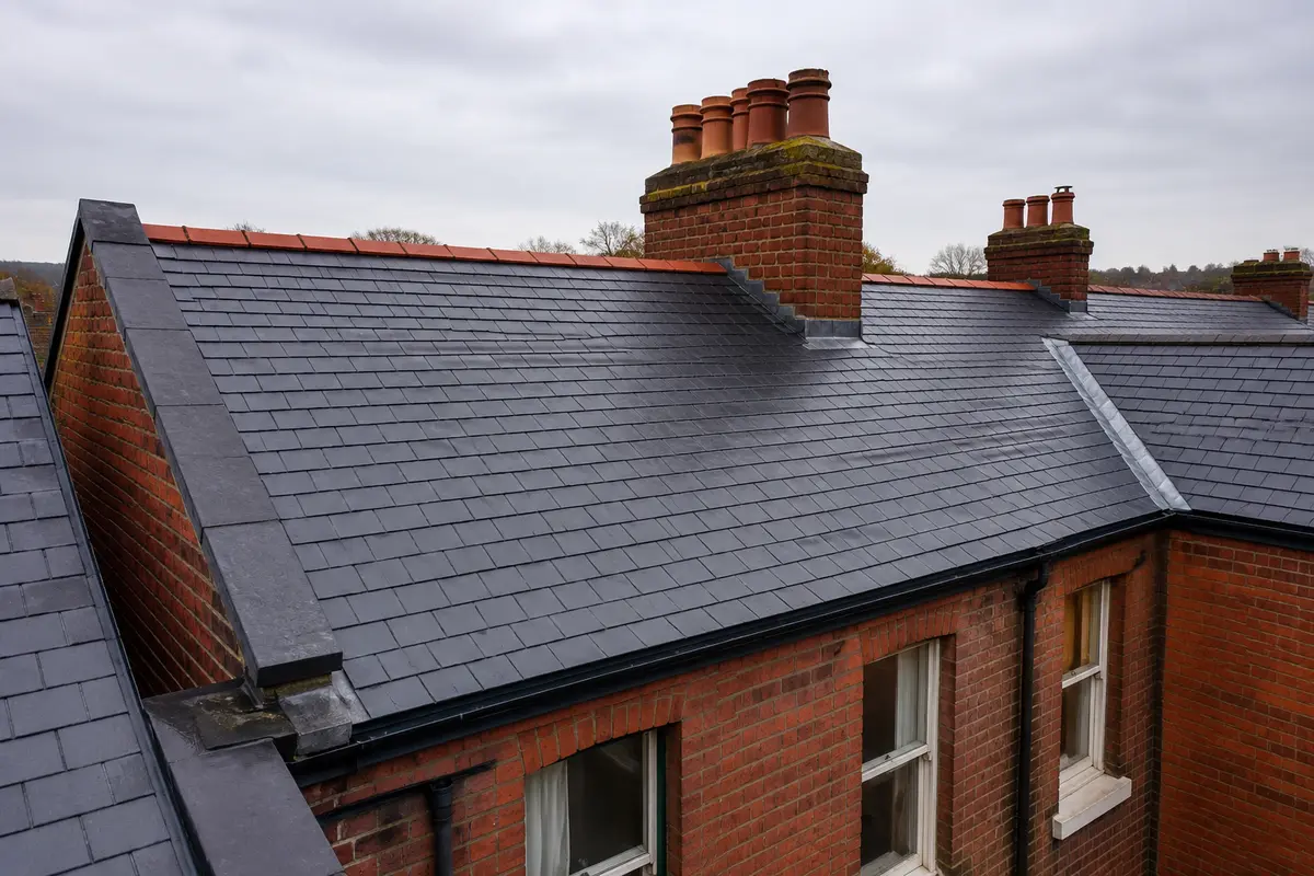 A restored Victorian slate roof on a Dublin red-brick terrace