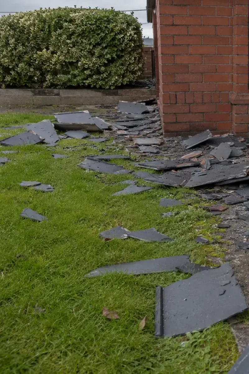 Storm-damaged slates lifted off a Dublin roof