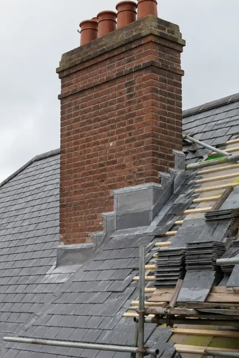 A restored Victorian slate roof on a Dublin red-brick terrace